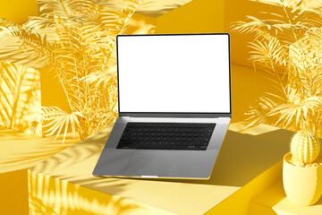 Poster - Laptop with an empty screen on an yellow abstract background with cubes arranged in an irregular manner, palm and cactus