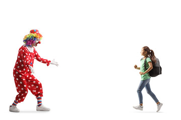 Canvas Print - Girl with a backpack running towards a clown