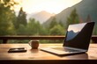 © Thares2020 - Laptop, Coffee, and the Sunset. Perfect Online Workstation on a Wooden Table. Work online concept
