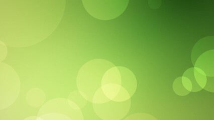 Wall Mural - Looped animated green abstract background of floating defocused particles