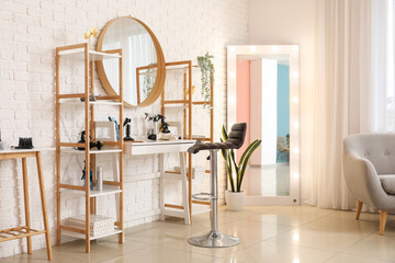 Sticker - Interior of beauty salon with hairdressing table and mirrors