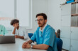 A doctor leading a meeting of the medical team in a modern medical room, fostering collaboration, communication, and effective decision-making to provide patient-centered care in a dynamic and