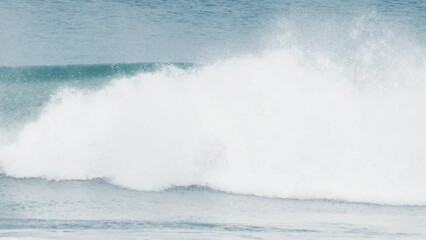 Poster - Surfer rides the wave in the ocean