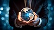 © Moritz - A businessman holds a global business globe, interconnected with a network, while focusing on digital marketing strategies and innovative solutions. Utilizing business development technology, this ind