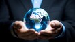 © Moritz - A businessman holds a global business globe, interconnected with a network, while focusing on digital marketing strategies and innovative solutions. Utilizing business development technology, this ind