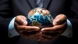 © Moritz - A businessman holds a global business globe, interconnected with a network, while focusing on digital marketing strategies and innovative solutions. Utilizing business development technology, this ind
