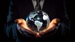 © Moritz - A businessman holds a global business globe, interconnected with a network, while focusing on digital marketing strategies and innovative solutions. Utilizing business development technology, this ind