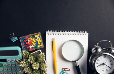 Poster - office workplace and items on the black background