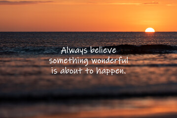 Wall Mural - Sunset background with inspirational quotes - Always believe something wonderful is about to happen.