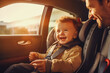 © VisualProduction - Baby girl sitting in the child car seat with seat belt fasten and smiling, car interior in the background