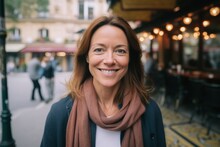 Close-up Portrait Photography Of A Grinning Woman In Her 40s That Is Wearing A Chic Cardigan Against A Parisian Or European Cafe Background .  Generative AI