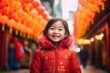 Medium shot portrait photography of a pleased child female that is wearing a chic cardigan against a vibrant and bustling chinatown during lunar new year background .  Generative AI
