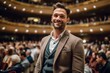 © Leon Waltz - Medium shot portrait photography of a pleased man in his 30s that is wearing a chic cardigan against a beautiful symphony orchestra performance in a concert hall background .  Generative AI