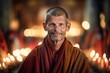 © Leon Waltz - Medium shot portrait photography of a pleased man in his 40s that is wearing a foulard against a serene meditation retreat with monks and candles background .  Generative AI
