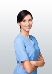 Poster - Healthcare concept, young woman doctor with arms crossed