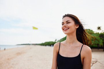 vacation woman ocean sand summer smile beach nature sea relax young