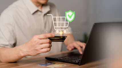 Poster - A customer uses a laptop computer to register through a credit card to make online purchases. Business concept of credit card shopping online, paying bills online, and various payments.