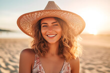 Portrait Of An Attractive Young Woman In Straw Hat Smiling On The Beach