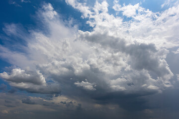Wall Mural - blue sky with stormy clouds background overlay. ideal for sky replacement