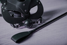 Adult Sex Games. Kinky Lifestyle. Bdsm Outfit Leather Cat Mask With Riding Crop Spank And Gag Ball