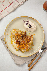 Wall Mural - Portion of gourmet cooked chicken with nut cream