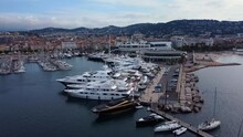 Expensive luxury superyachts and megayachts and ships docked at port