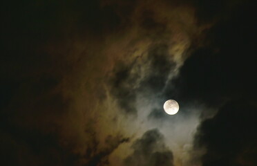 Wall Mural - bright moon floating on sky in cloud background