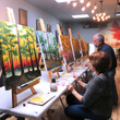 © posteriori - Happy group of motivated diverse people enjoying painting art class, generative ai