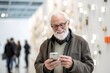 Environmental portrait photography of a grinning old man using the mobile against a modern art gallery background. With generative AI technology