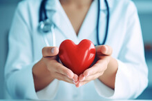 Doctor Holding Red Heart In Hands