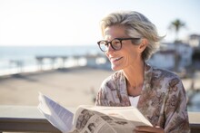 Environmental Portrait Photography Of A Satisfied Mature Woman Reading The Newspaper Against A Picturesque Beach Boardwalk Background. With Generative AI Technology