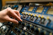 Sound engineer using digital audio mixer sliders Engineer pressing keys adds control panel volume Recording studio technician close up