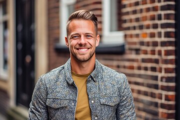 Wall Mural - Headshot portrait photography of a happy boy in his 30s walking against a brick wall background. With generative AI technology