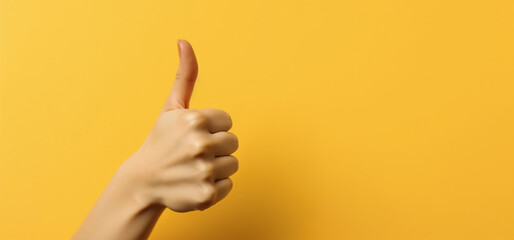 Wall Mural - hand with thumb up on yellow isolated background.close up view.copy and text space.created with gene