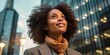 © Adriana - Happy wealthy rich successful black businesswoman standing in big city modern skyscrapers street on sunset thinking of successful vision, dreaming of new investment opportunities. Generative AI