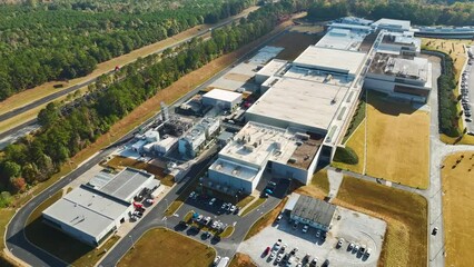 Poster - Aerial view of new big factory complex for producing and shipping of industrial equipment. Global manufacture concept