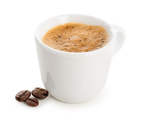 Cup of delicious espresso and coffee beans on white background