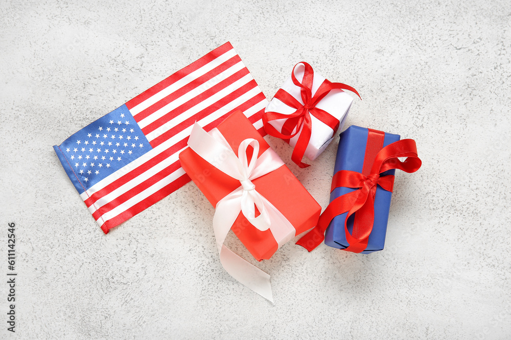 Gift boxes for American Independence Day with USA flag on grunge white background
