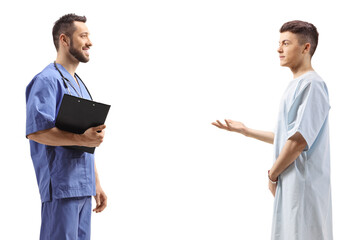 Wall Mural - Male healthcare worker and a young male patient having a conversation
