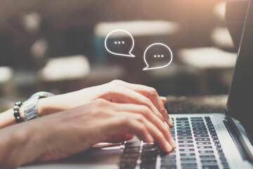Woman hand use computer to chat or communicate in social media.