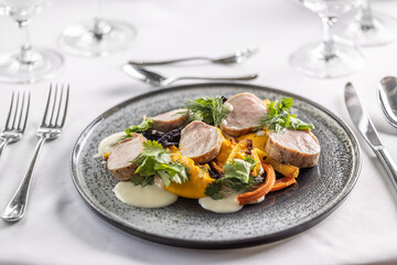 Wall Mural - Pork medallions with carrot puree and baked carrots