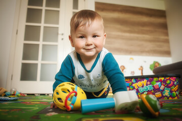 Wall Mural - Cute baby boy crawls on the home floor, explore the world and things around him. Love and family emotion