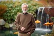 © Markus Schröder - Environmental portrait photography of a glad mature man wearing a cozy sweater against a tranquil koi pond background. With generative AI technology