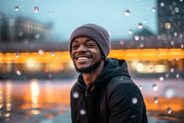 Wall Mural - Medium shot portrait photography of a satisfied boy in his 30s wearing a warm beanie against a vibrant city fountain background. With generative AI technology