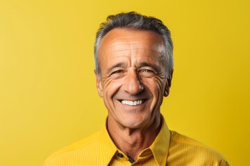 Canvas Print - Headshot portrait photography of a grinning mature man smiling against a bright yellow background. With generative AI technology