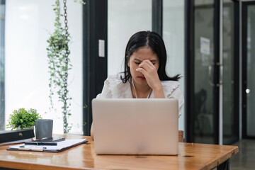 Sticker - burnout or tired business woman is sleepy in the office from deadlines, overworked or overwhelmed. Depression, fatigue or exhausted female worker working on computer at desk