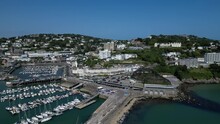 Torquay, Torbay, South Devon, England: DRONE VIEWS: The Drone Flies Towards The Former Tourist Attraction, Living Coast, Torquay Marina And The Hillside Properties Of The Town Of Torquay (Clip 4).