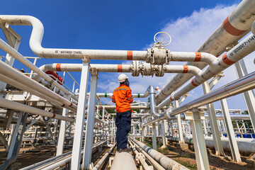 Canvas Print - Male worker inspection at valve of visual check record pipeline oil and gas