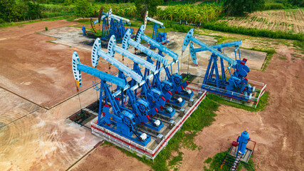 Wall Mural - Top view In the field crude oil country industry the oil rig pump in the evening of the pumping unit