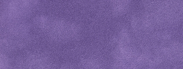 Texture of velvet matte violet background, macro. Suede purple fabric with pattern. Seamless lavender textile